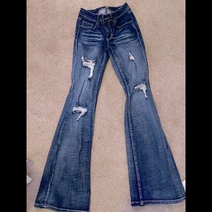 Boot cut ripped jeans